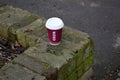 Costa Coffee Cup left on a Wall Royalty Free Stock Photo