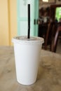 Disposable cup for beverages with straw Royalty Free Stock Photo