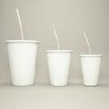 Disposable cup of big volume for beverages with straw on a gray background Royalty Free Stock Photo