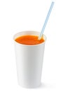 Disposable cup of orange fizzy drink and straw Royalty Free Stock Photo