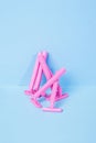 Disposable female pink razor on a blue background. A tool to remove hair from the skin. Female depilation and hygiene. Body care. Royalty Free Stock Photo