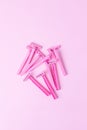 Disposable female razor on a pink background. A tool to remove hair from the skin. Female depilation and hygiene. Body care. Top Royalty Free Stock Photo