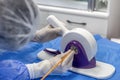 Disposable heart valve crimping tool. In the operating room, the doctor prepares the heart valve for transplantation to the Royalty Free Stock Photo