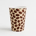 Disposable Paper Coffee Cup with a Pattern of Roasted Coffee Beans on a Light Background Royalty Free Stock Photo