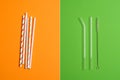 Disposable Plastic Cocktail Drinking Straws vs Eco friendly Reusable Straight Glass Tube Drinking Straws with Cleaning Brush Clear Royalty Free Stock Photo