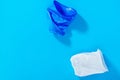 Blue and white disposable plastic cups on a blue background. the concept of abandoning plastic. the use of plastic. top view flat Royalty Free Stock Photo