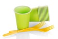 Disposable plastic cups and forks isolated on white Royalty Free Stock Photo