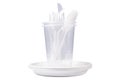 Disposable plastic tableware. Cups, plates, forks, knives and spoons isolated on white background