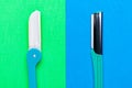 Disposable razor blade on green and blue background. Single use razors blade. Disposable shaving razors. Body care Royalty Free Stock Photo
