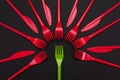 Disposable red and green plastic forks isolated on background Royalty Free Stock Photo