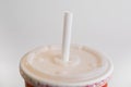 Disposable straw on a cup Royalty Free Stock Photo