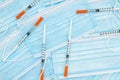 Disposable surgical face mask and needles background