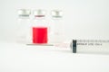 Disposable syringe and injection vials background Royalty Free Stock Photo