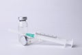 Disposable syringe with needle and vials on white background Royalty Free Stock Photo