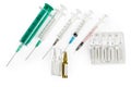 Disposable syringes different sizes and ampules of medications, top view Royalty Free Stock Photo