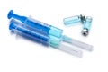 Disposable syringes with needles and vials on white background Royalty Free Stock Photo