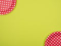 Disposable tableware for a holiday on a colored background. Royalty Free Stock Photo