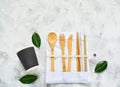 Disposable tableware made of environmental materials. Paper, bamboo glasses, cocktail tubes. Wooden forks and knives. Plastic free Royalty Free Stock Photo