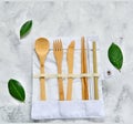 Disposable tableware made of environmental materials. Paper, bamboo glasses, cocktail tubes. Wooden forks and knives. Plastic free Royalty Free Stock Photo