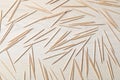 Disposable toothpicks on white wooden background, flat lay Royalty Free Stock Photo