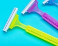 Disposable Women Razors  on blue Royalty Free Stock Photo