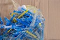 Disposal of medical waste used disposable syringes lie in a large pile Royalty Free Stock Photo