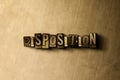 DISPOSITION - close-up of grungy vintage typeset word on metal backdrop