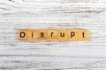 DISRUPT word made with wooden blocks concept