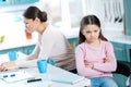 Dissatisfied girl and her mom working Royalty Free Stock Photo