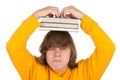 Dissatisfied teenager with books