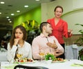 Dissatisfied visitors in restaurant