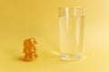 Dissolvable drinks dissolving cubes to add superfoods. On a yellow background
