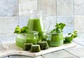 Dissolvable green smoothie Drink made from frozen compressed fruit cubes. Close up, selective focus