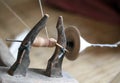 Distaff, spinning yarn on spinning wheel Royalty Free Stock Photo