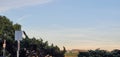 distance and air of the sky and small manicured houses view of signs and green trees