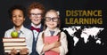 Distance education and learning concept. Happy smiling kids on blackboard background Royalty Free Stock Photo