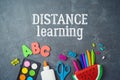 Distance learning and education concept. Study online from home with top view table and school supplies