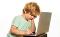 Distance Learning online education. Little boy with laptop. Schoolboy does homework at home.