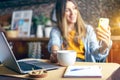 Distance learning online education and work. Business woman having a facetime video call. Happy and smiling girl working from home Royalty Free Stock Photo