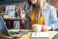 Distance learning online education and work. Business woman having a facetime video call. Happy and smiling girl working from Royalty Free Stock Photo