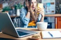 Distance learning online education and work. Business woman having a facetime video call. Surprised girl working from home office Royalty Free Stock Photo