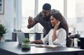 The distance makes no difference in running their business. two businesspeople making a video call on a laptop in an