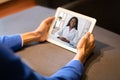 Distance Medicine Concept. Unrecognizable Man Having Video Call With Black Therapist Lady Royalty Free Stock Photo