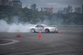 distance scene of amateur driver practicing car drifting. Royalty Free Stock Photo