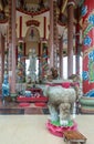 Distance shot of Guan Yin in the center of her shrine on Ko Loi Island, Si Racha, Thailand