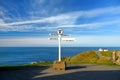 Distance signpost at Land`s End, Penwith Peninsula, Cornwall, most westerly point of England. Royalty Free Stock Photo