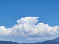 Distant cloud shaped like a wing above a mountain ridge at Lake Tahoe Royalty Free Stock Photo