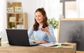 teacher with laptop having online class at home Royalty Free Stock Photo