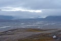 Distant Glacier Brooding in the Fog Over Its Glacial Valley