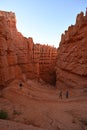 Distant hikers on the Navajo Loop Trail in Bryce Canyon National Park. Royalty Free Stock Photo